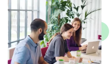 three people in a meetingroom